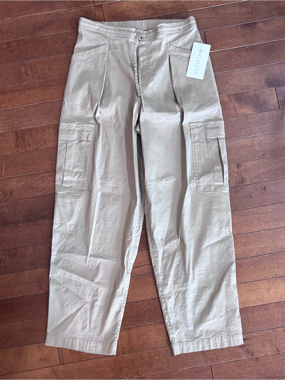 Athleta Paradise Straight Leg Cargo Jumpsuit Pants in Light Tan